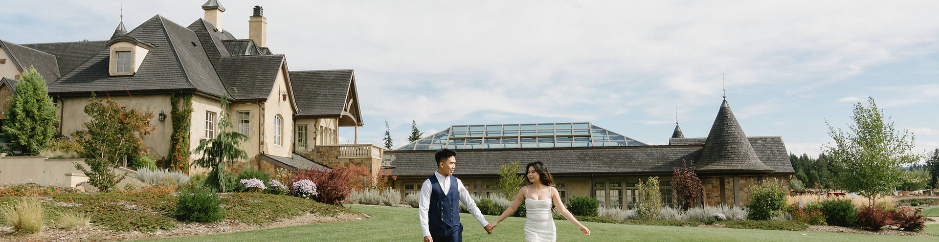 Chateau de Lis grounds with wedding couple